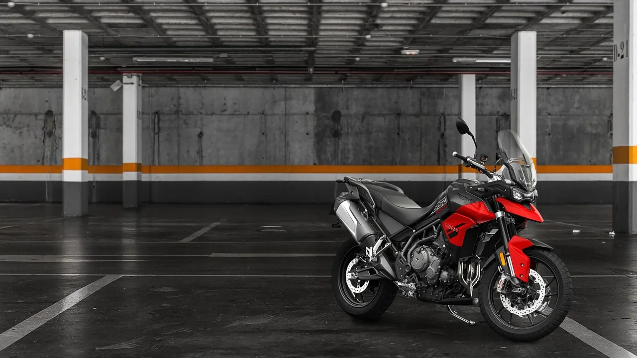 triumph tiger 850 sport, motorbike, parking garage, motorcycle, parking lot, vehicle, motorcycle, parking lot, parking lot, parking lot, parking lot, parking lot. How much to charge for parking lot striping work for 2027