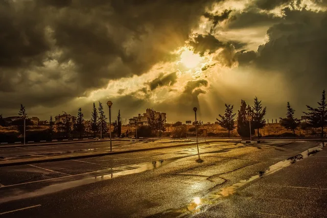 parking lot, sunset, sky, clouds, dramatic, storm, nature, rainy day, dusk, reflections, glowing, sunlight, sunbeam, autumn, brown storm. The parking lot striping services that make the most money