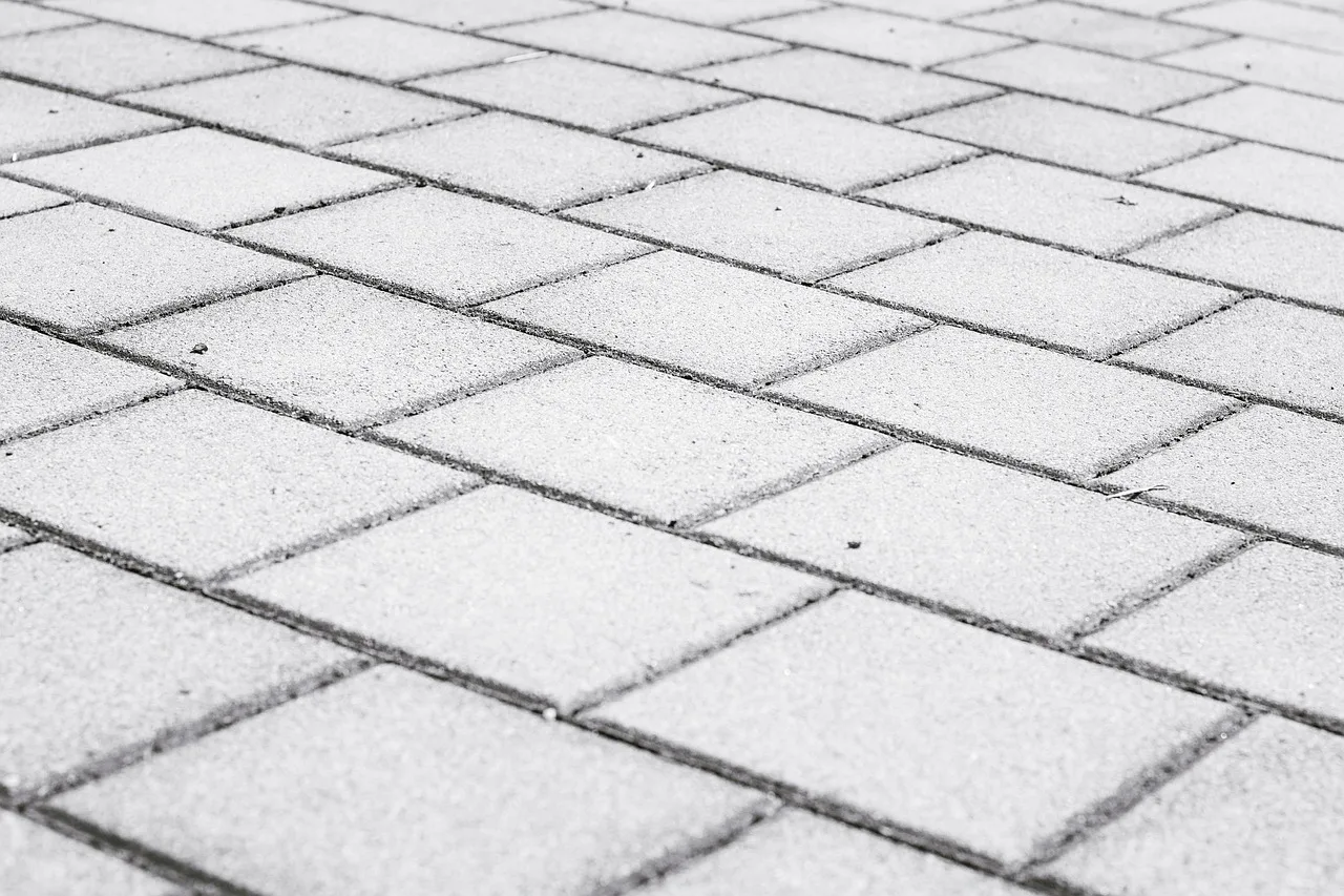 path, road, pavement, parking lot, paved, gray, paving stones, pattern, texture. The real cost of insuring a parking lot striping business