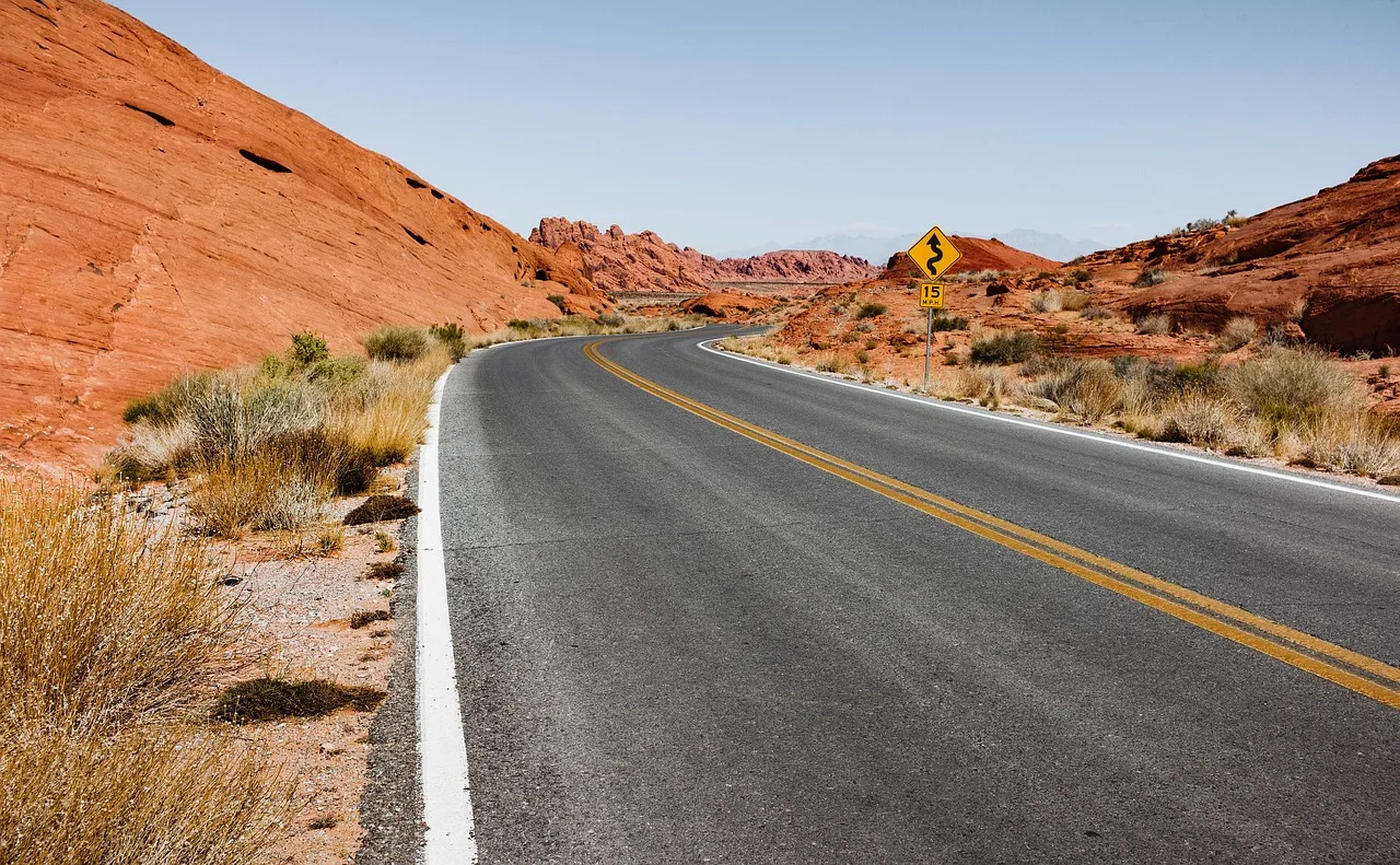 desert, road, badlands, barren, barren landscape, street, curved road, arid, asphalt, dry, highway, landscape, outdoors, travel, nature, road, road, street, asphalt, highway, highway, highway, highway, highway. Reflective striping Phoenix Las Vegas: heat and upkeep