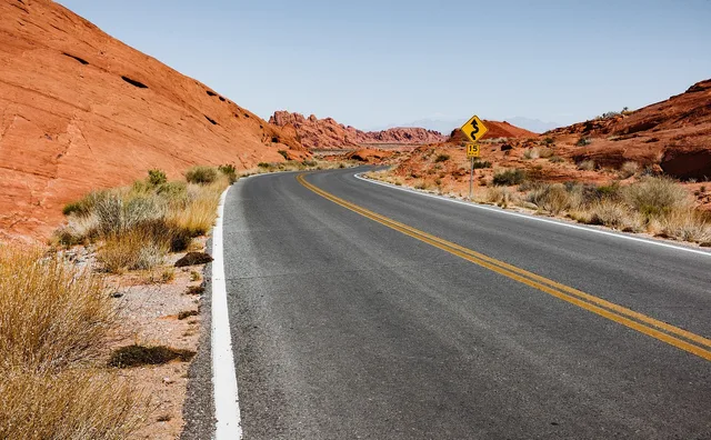 desert, road, badlands, barren, barren landscape, street, curved road, arid, asphalt, dry, highway, landscape, outdoors, travel, nature, road, road, street, asphalt, highway, highway, highway, highway, highway. Reflective striping Phoenix Las Vegas: heat and upkeep