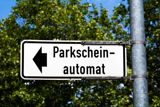 parking ticket, parking ticket machine, park, parking spot, parking spaces, parking space, a notice, sign, traffic sign, cars, two-wheelers, traffic, vehicles. Sun Belt vs Snow Belt striping seasons, when each region can paint
